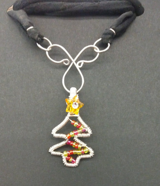 Beaded Christmas tree pendant $15 each.