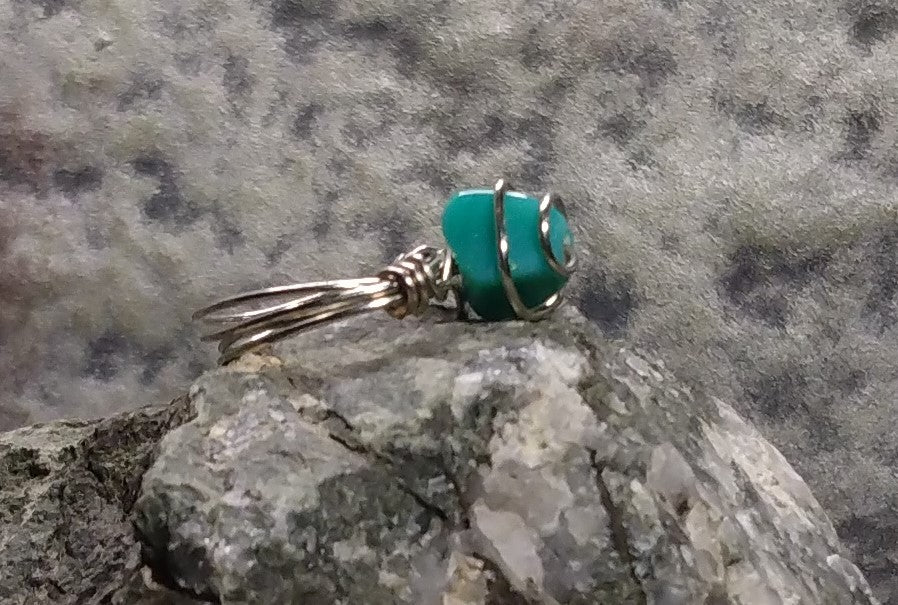 teal and silver bead swirl